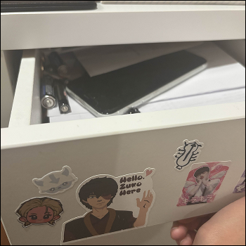 The desk drawer opened