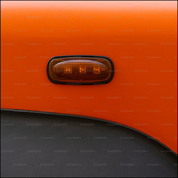 a car's turn signal on Unsplash. https://unsplash.com/photos/a-close-up-of-an-orange-car-with-a-light-on-NLZ636OV790
.<br><audio controls src='audio/turnsignal22.mp3'></audio>